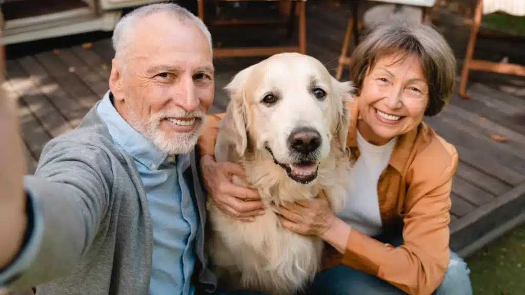senior couple with dog
